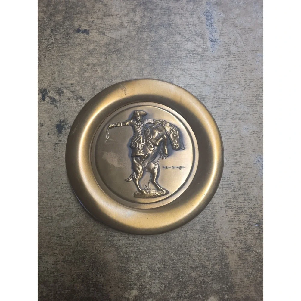 FREDERIC REMINGTON'S BRONZE COLLECTORS PLATE THE BRONCO BUSTER